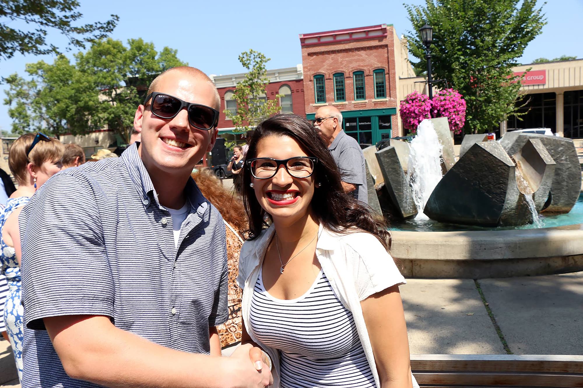 Stephen Dewyer meeting Erin Maye Quade at gathering in front of public art for Public Arts Commission