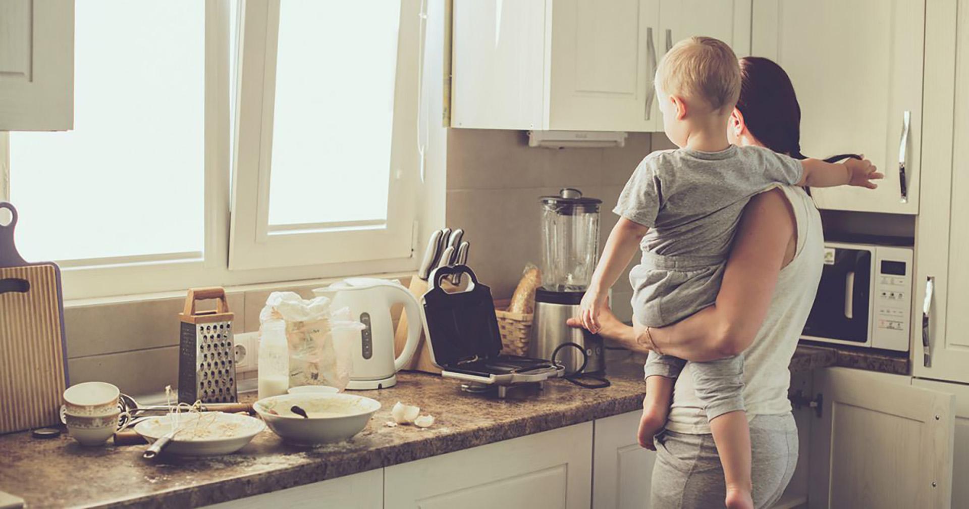 busy parent cooking with child